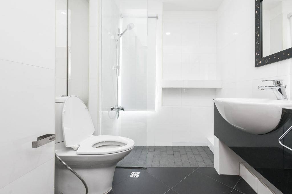 White toilet bowl in the bathroom for small bathroom ideas