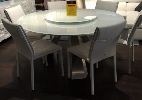 Cattelan Italia - Eliot Round dining table and Isabel leather dining chairs